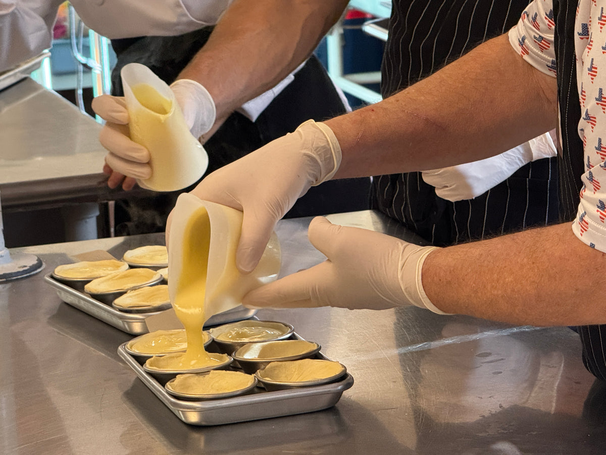 Guests enjoying a DoceHaven Pastel de Nata baking class